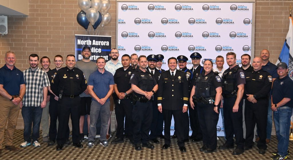 Chief Joe DeLeo with members of the North Aurora Police Department