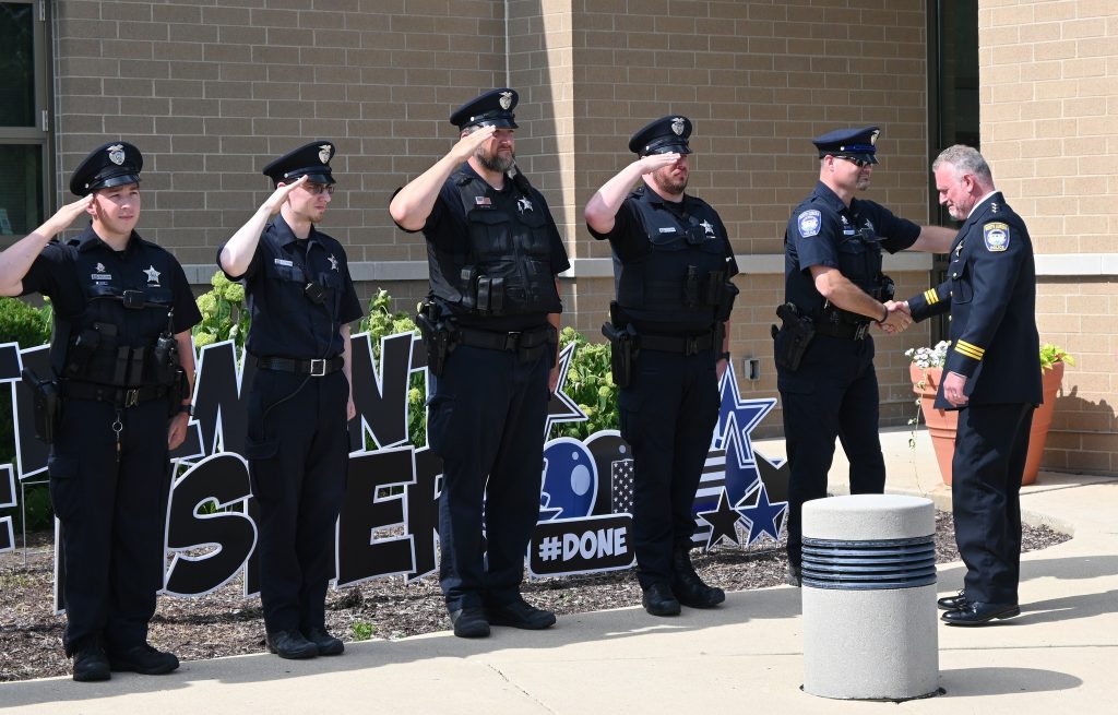 Officers Saluting Chief David Fisher