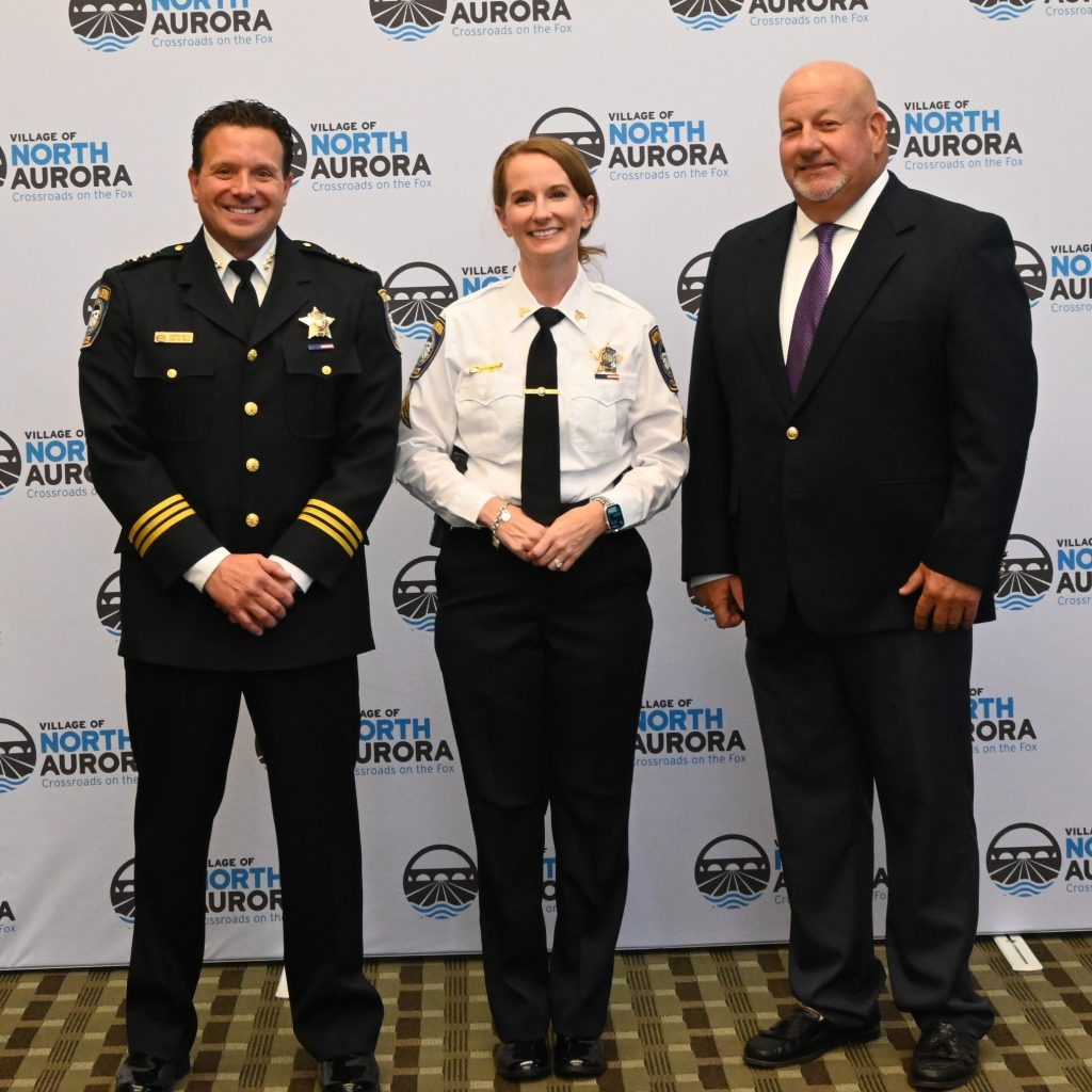 Chief Joe DeLeo (L) with newly sworn in Sergeant Kristen Lohrstorfer (middle) and Mayor Mark Gaffino.